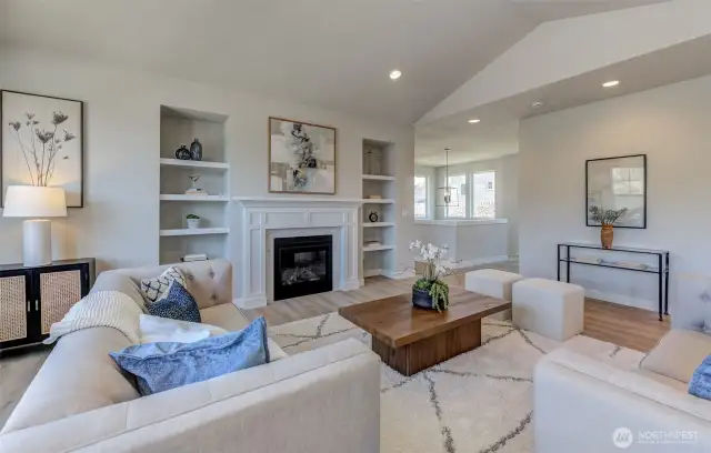 A look back toward the entrance stairs.. lovely fireplace for cozy days & nights