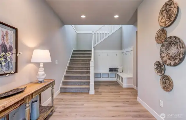 The wide and spacious entry is inviting -and- organized!