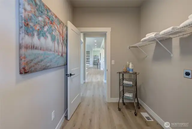Upper Laundry is conveniently connected to the primary closet