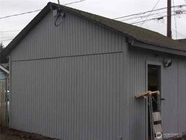 East side of utility building.  Use for storage or shop.