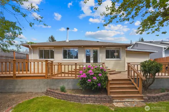 Backyard with spacious deck.