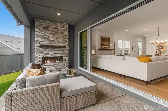 Covered patio with exterior fireplace  *Photos for illustrative purposes only; taken from a similar model"