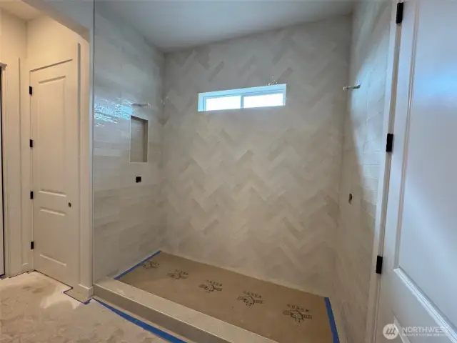 Luxury tiled expanded shower with dual shower heads