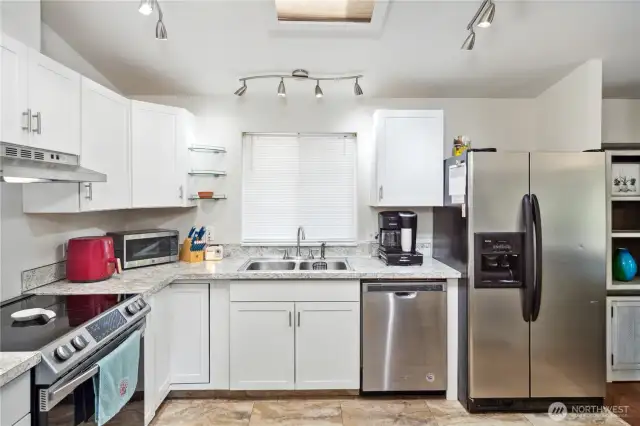 Nice white shaker style cabinetries.