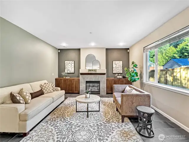 The living room is hardwired for surround sound speaker system
