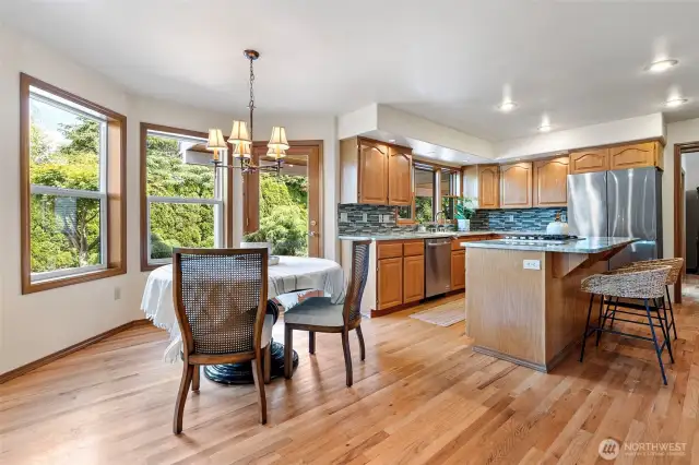 Ample casual dining space with covered porch entrance