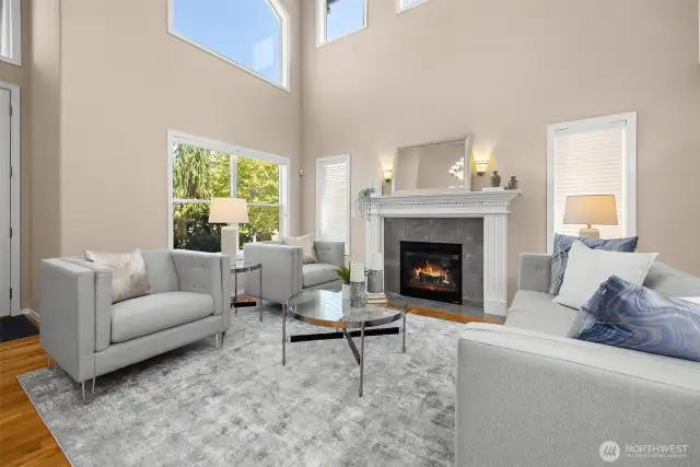 The formal living room features one of two gas fireplaces, perfect for a rainy day.