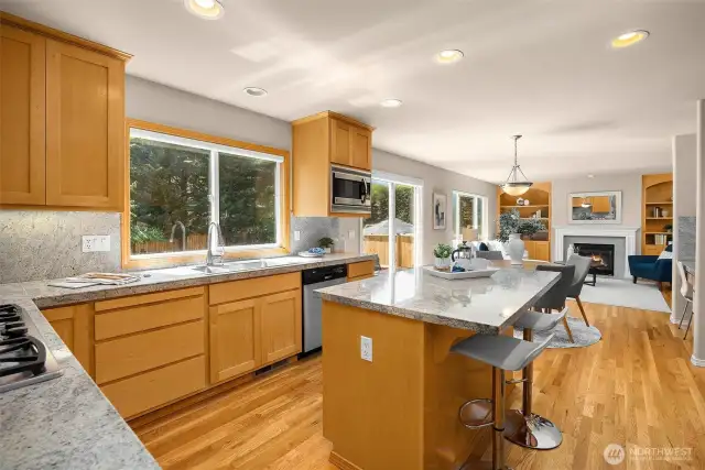 This kitchen's size & flow work well for modern living. Friends & family can gather around the spacious island, and the chef is connected to the action in the back yard or adjacent family room.