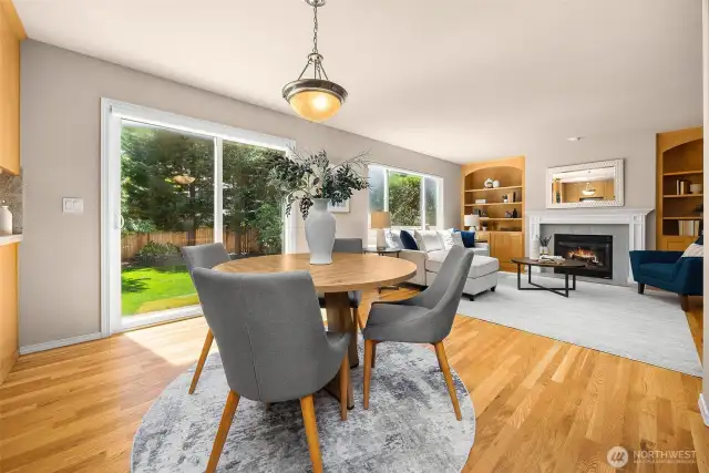 The breakfast nook enjoys a front row view to the back yard; steps just out the sliding door lead to the patio for indoor/outdoor flow.