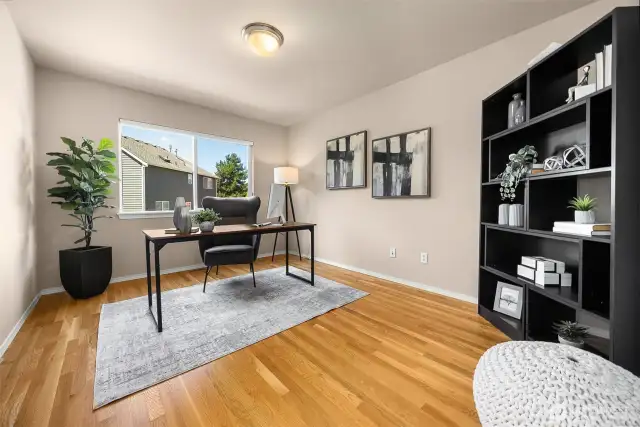 This spacious home office is located on the main level just off the family room yet far enough from the kitchen/dining for solitude.