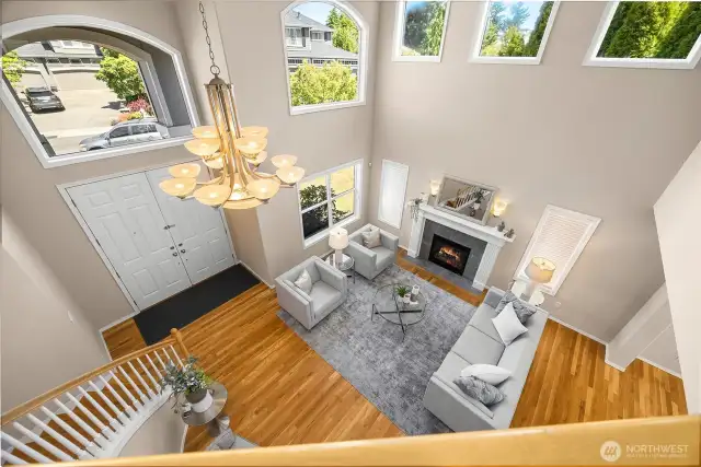 Bird's eye view of the entry & living areas from just outside the primary bedroom.