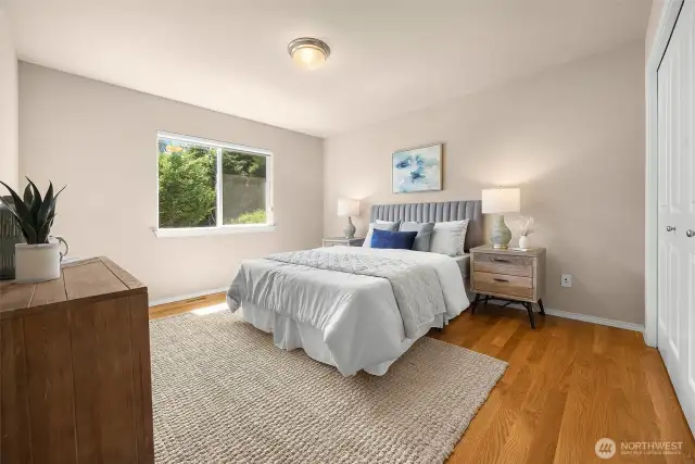 The second of 4 total bedrooms on the upper level also overlooks the back yard. Generous closet space in every bedroom!