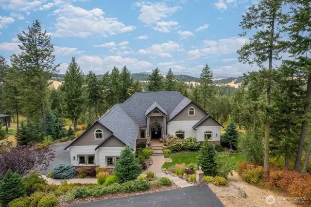 Gorgeous front view of home and driveway