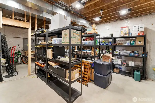Ample storage room with work bench