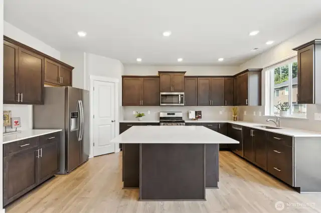 Counter space, cabinets, pantry, stainless steel appliances--this kitchen has it all.