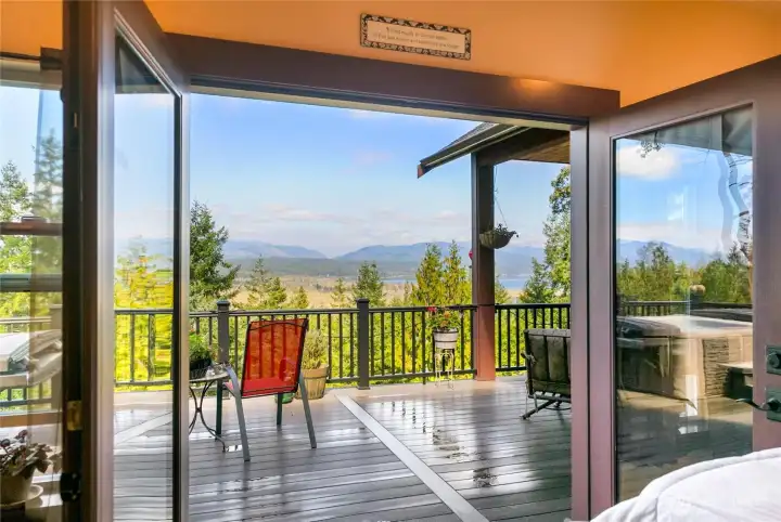 head out to your hot tub from the primary bedroom French doors.
