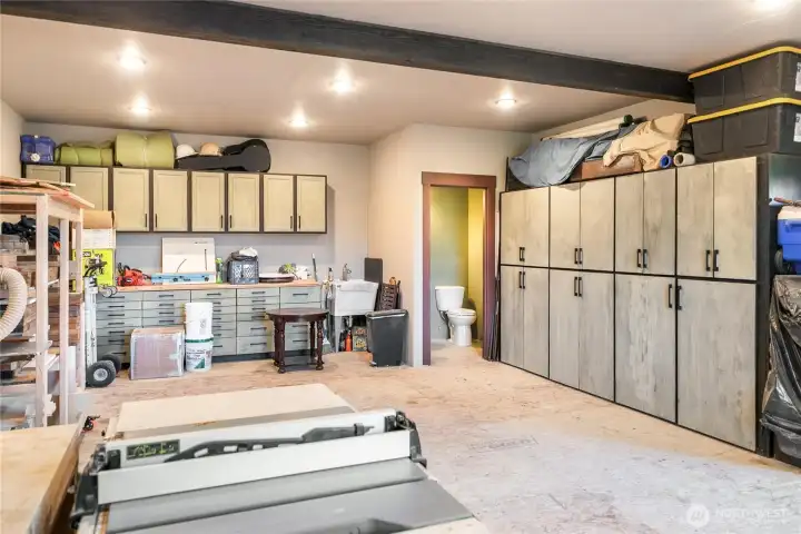 Half bath in the shop with custom cabinets.