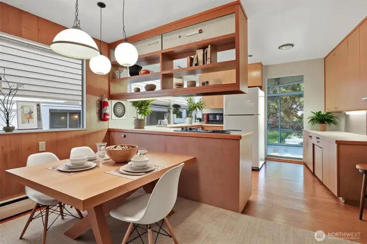 Virtually staged kitchen and breakfast nook.
