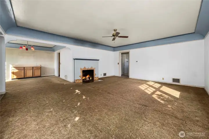 Wonderful space as it currently exists, just needs some new carpet/flooring and some fresh paint!
