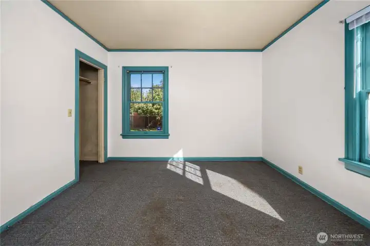 Another view of the main floor bedroom showing the closet.
