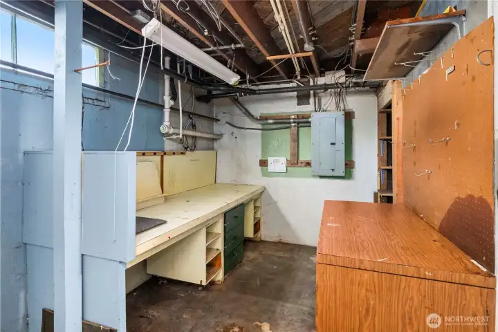 Another view of the basement shop space.