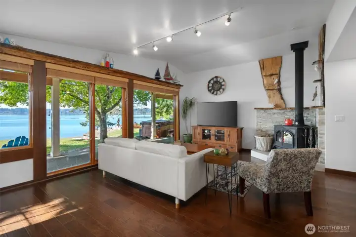 Relax and watch the ever changing sunsets while you enjoy the cozy wood stove.