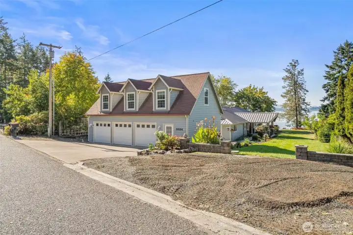 Bonus...Spacious 3 car detached garage and additional off street parking.