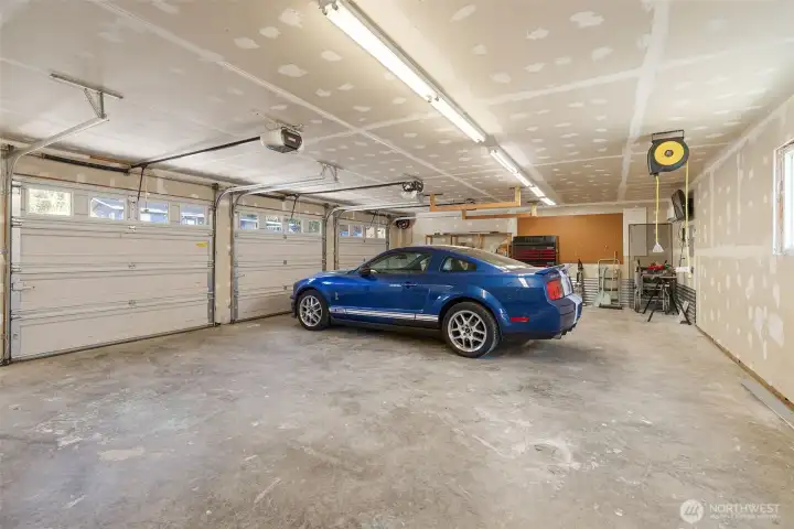 Large garage with extra side space.