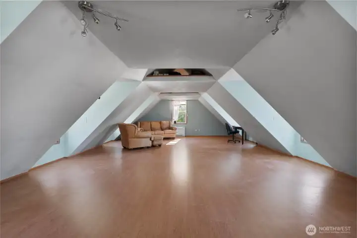 Huge extra space above garage for whatever your needs.  Sellers stubbed in a sewer line down below at back garage wall.  They did not verify with the county if an ADU or added bathroom is allowed.  Buyers to verify to their own satisfaction.