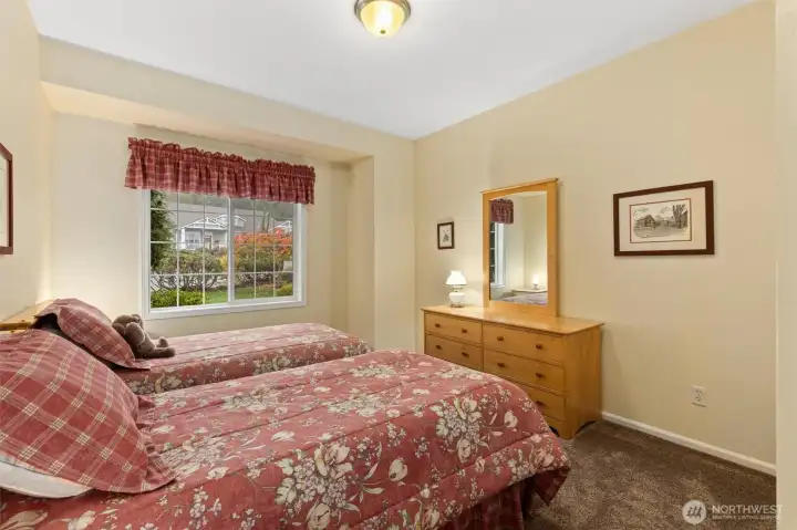 Bedroom #2 on the opposite side of the main floor from the primary bedroom. Has a walk-in closet.