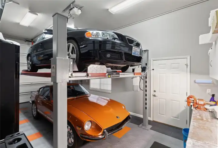 Over height 3rd bay of the garage is perfect for storing your RV or for a car lift.  (Car lift does not convey.)