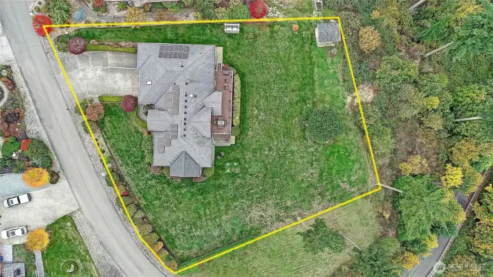 Approximate lot lines. Community property (not buildable lots) to the North and East of the parcel.