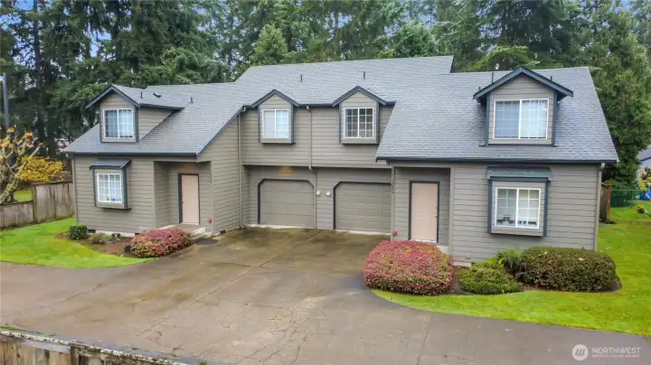 12405 & 12407 duplexes well-maintained with updated siding, paint and gutters