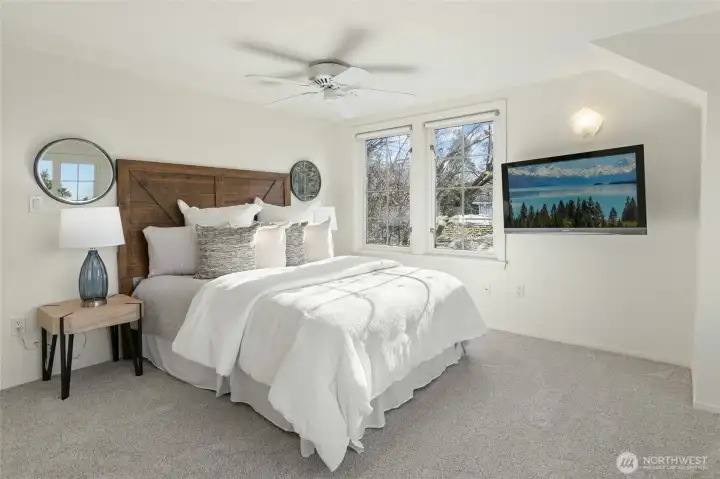 Wall mounted TV stays with home.