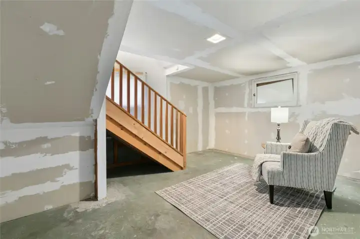 Partially finished daylight basement is brimming with possibilities.