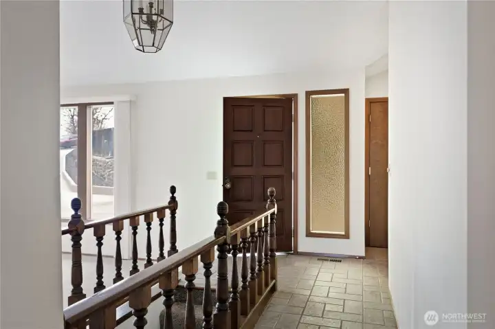 Welcoming Bright Entryway - Staircase to Lower Level on Left