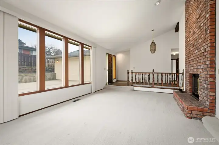 Abundant Natural Light - Dramatic Fireplace
