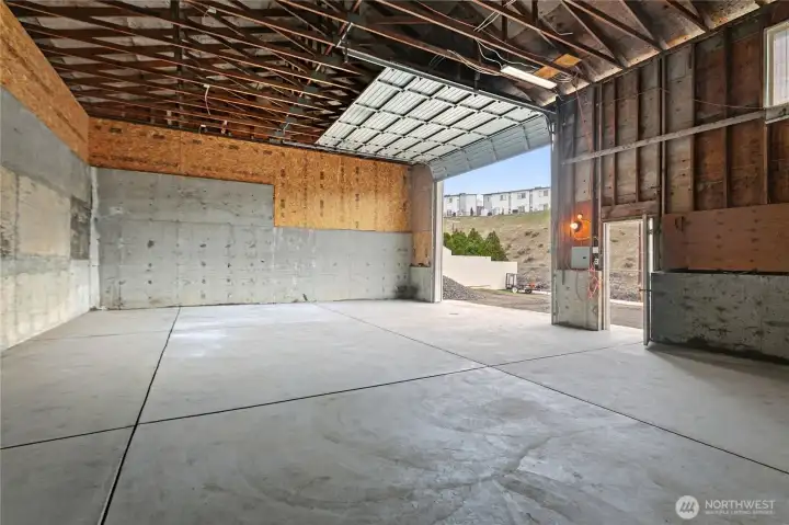 1216 SF Shop - Spacious shop interior with high ceilings and wide access - perfect for projects, storage,  workshop use or oversized garage.