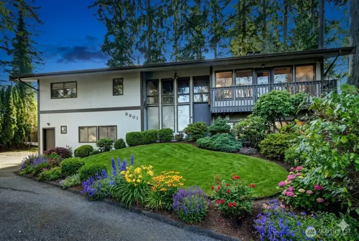 Adorable Mid-Century Modern Home on your own quiet, private Oasis! AI enhanced landscaping.