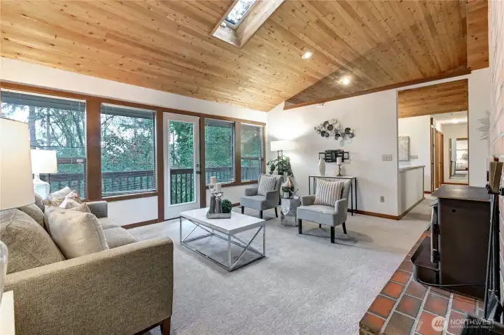 Inviting, cozy living room featuring a highly efficient fireplace insert that maximizes warmth and ambiance.