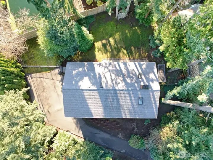 Aerial view of home nestled in a quiet garden setting!