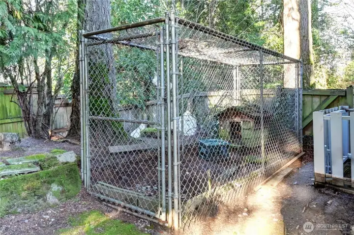 Fully fenced rear yard with dedicated canine area.