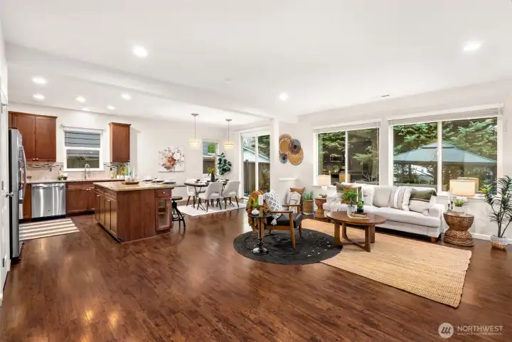 Spacious living room that flows to open concept kitchen and dining room
