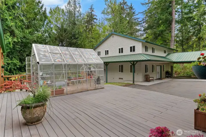 Looking back from the main house to the greenhouse and ADU