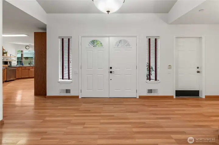 View from the dining room to the double front doors