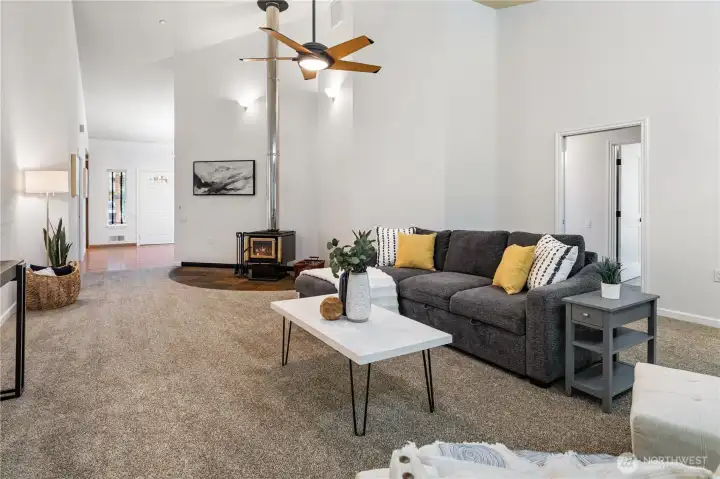 Living room woodstove and ceiling fan
