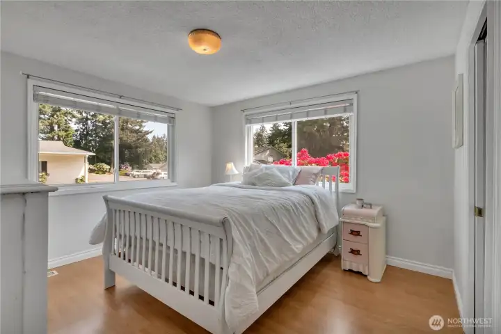 Welcoming primary bedroom for your retreat with large walk-in closet