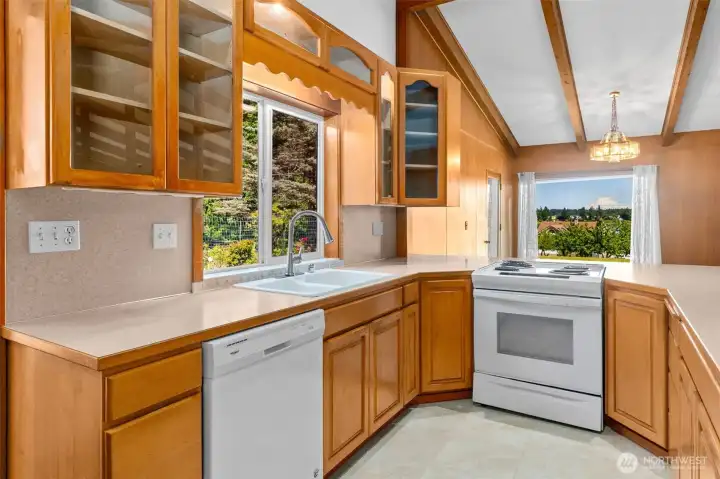 kitchen open to dining w views of the water and Rainier kitchen open to dining w views of the water and Rainier