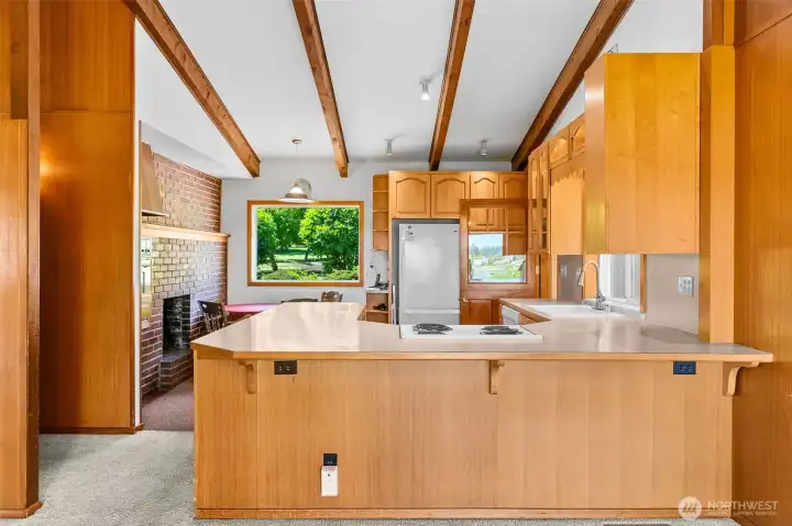 Kitchen w views to back yard as well and informal dining area Kitchen w views to back yard as well and informal dining area