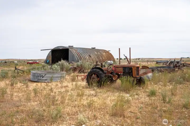 Quonset Hut and yard debris
